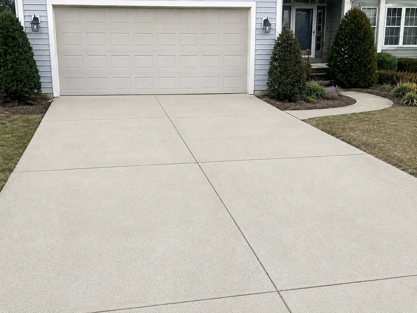 After driveway and residential concrete cleaning on a residential property